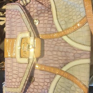 Guess Bag purple gray and tan in color.
